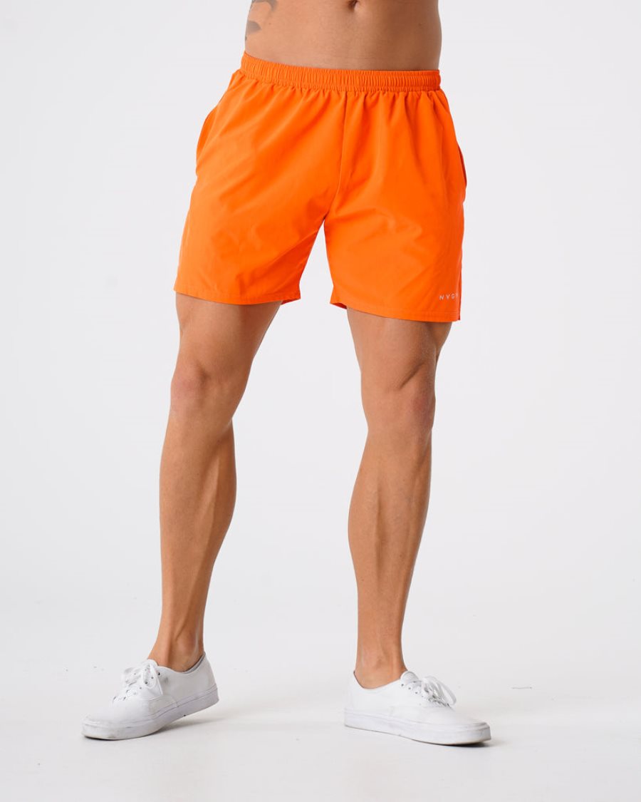 Pantalones Cortos NVGTN Flex Hombre Naranjas | 9JVF9Z6n